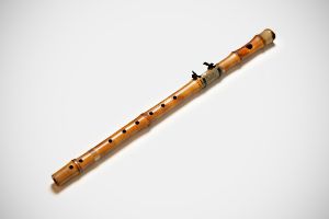 A long wooden flute