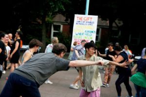 People dancing and moving together