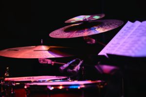 Close up of a drumset and a score