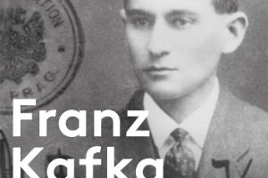 Exhibition poster “Franz Kafka. The entire Trial”. Image: Passport photograph, Kafka about 32 years old, 1915/16 © Archiv Klaus Wagenbach