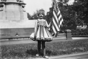 Costumed girl with US flag