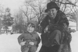 Woman and child in the snow.