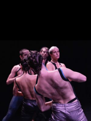 Five dancers, facing each other