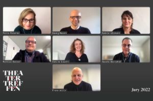 The seven Theatertreffen jury members are in a video conference and look into the camera.